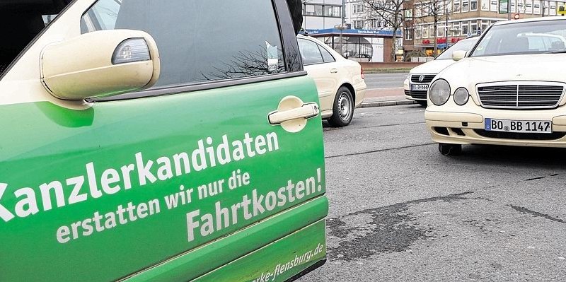 Taxi-Aufdruck mit Werbung für Strom.jpg