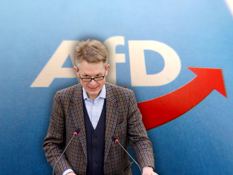 AfD-Politiker Gunnar Beck vor einem AfD-Logo