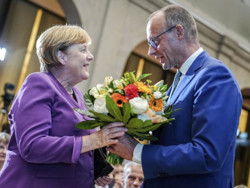 Merz und Merkel.